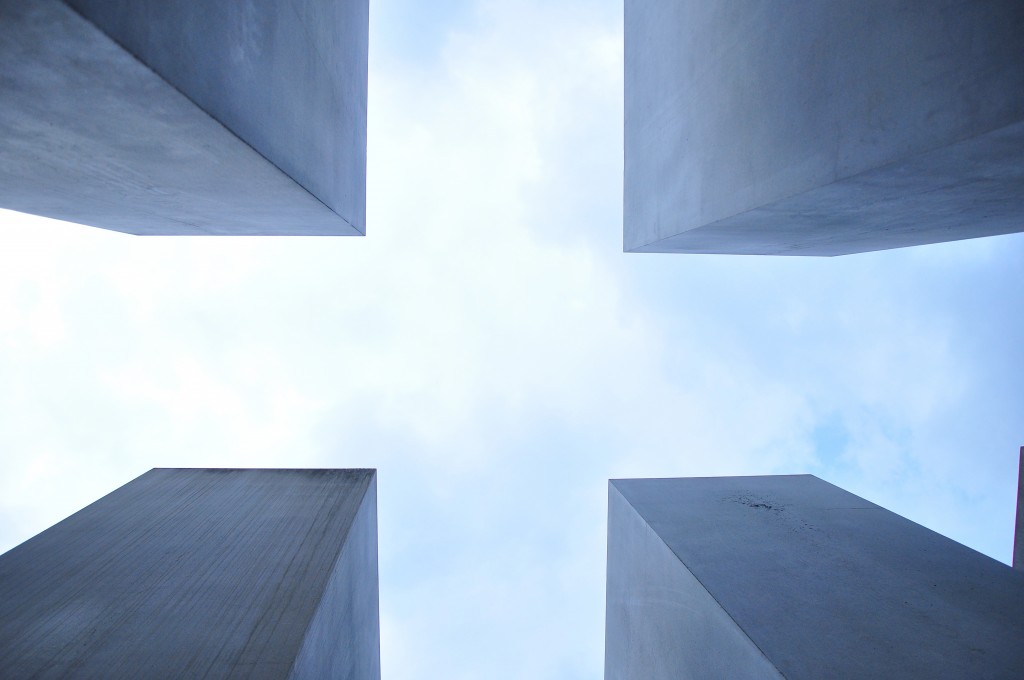 Skyscrapers outlining a cross symbol in the sky.
